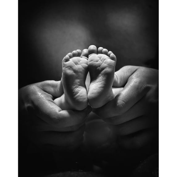 Posterazzi DPI1874994LARGE Adult Hands Holding Bare Baby Feet Poster Print, 28 x 36 - Large