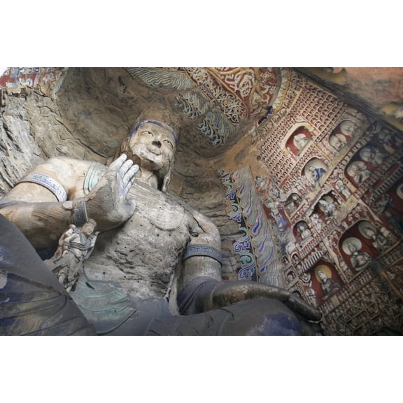 Statue And Carvings In Ancient Buddhist Temple Grotto. Poster Print (17 x 11)