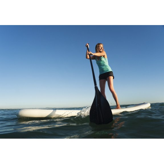 Posterazzi DPI1883354 A Woman Paddling While Standing On A Surf Board Off Dos Mares Beach - Tarifa, Cadiz, Andalusia, Spain Poster Print, 18 x 12