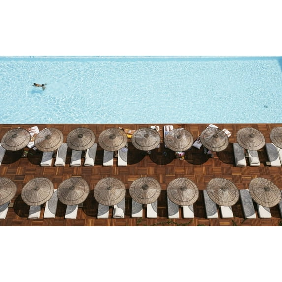 Posterazzi DPI1889641 Man Swimming In Pool By Sunloungers, Aerial View Poster Print, 19 x 12