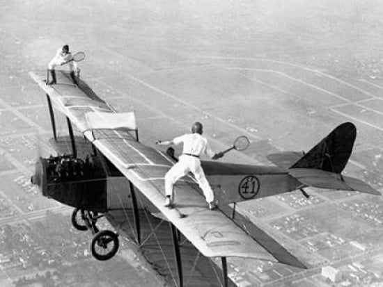 Posterazzi Daredevils Playing Tennis on a Biplane 1925 Canvas Art - Anonymous (22 x 28)