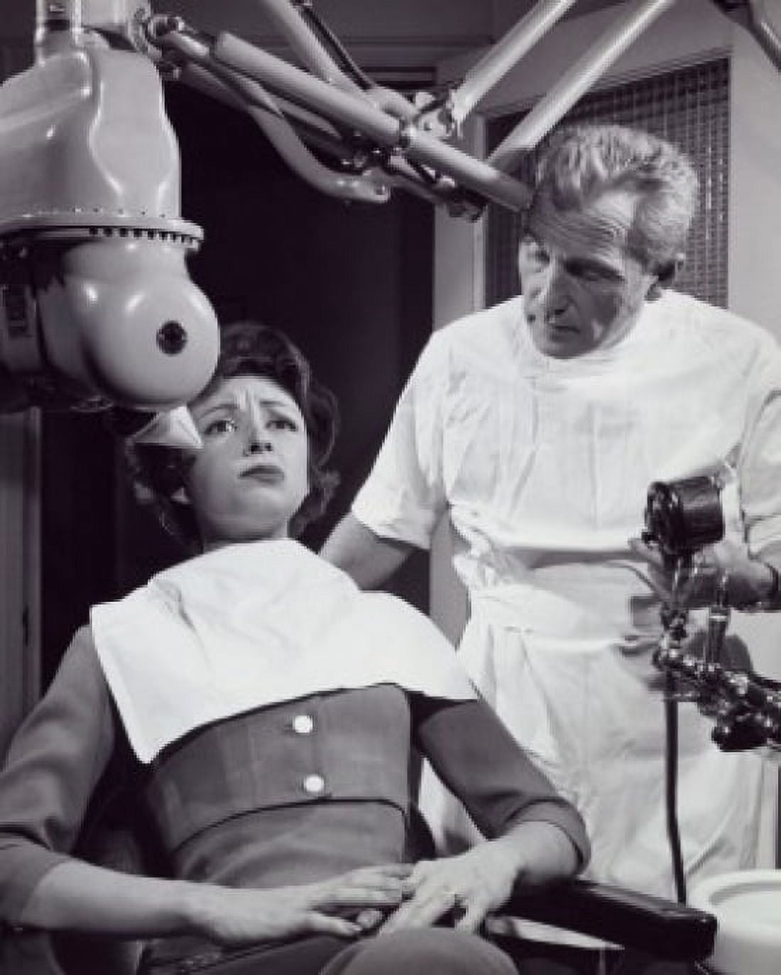 Posterazzi Female patient getting treatment from a dentist Canvas Art - (24 x 36)