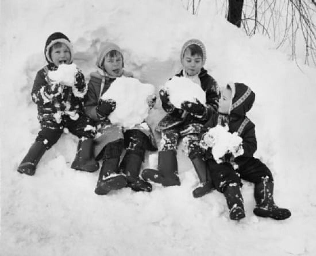 Posterazzi Four children playing with snow Canvas Art - (24 x 36)