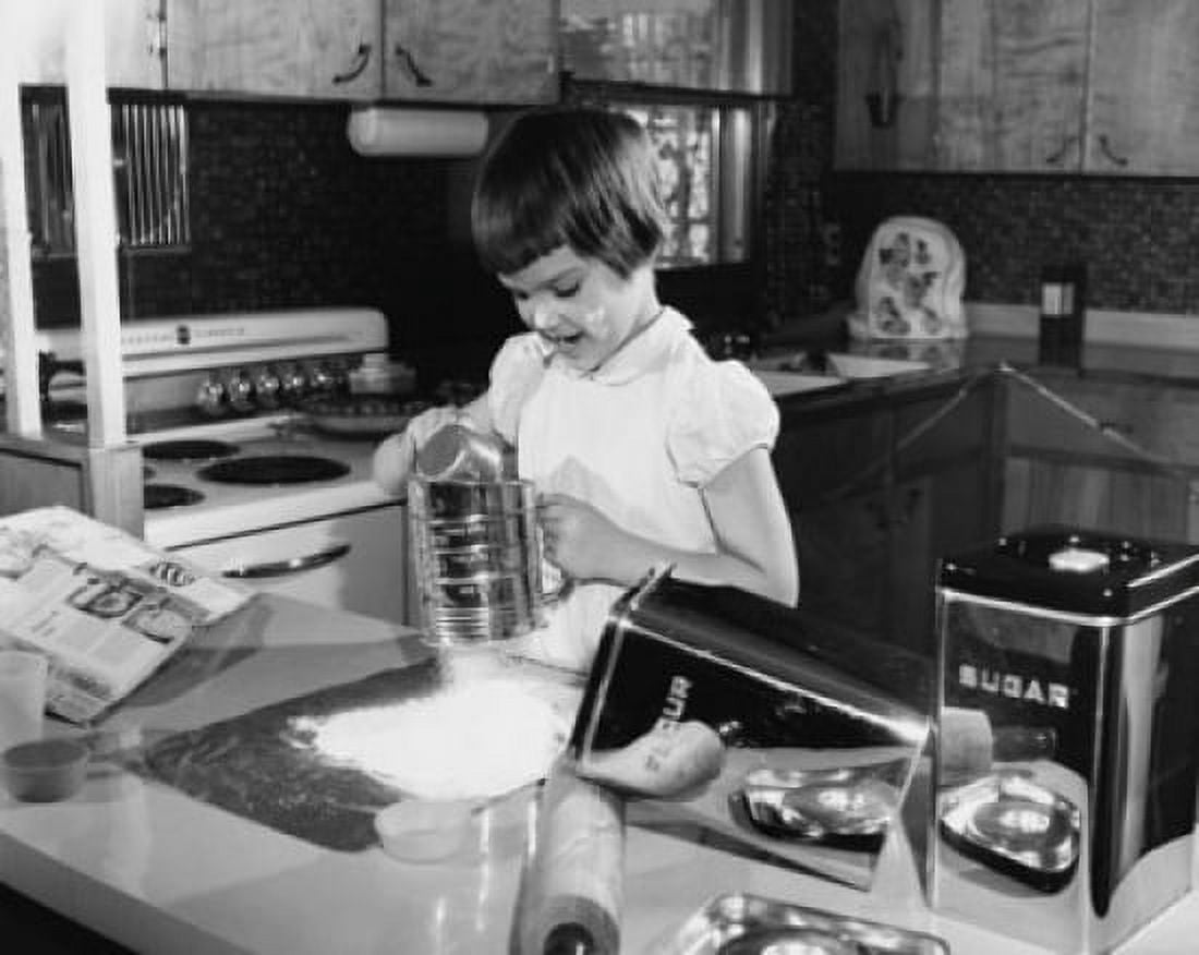 Posterazzi Girl working in a kitchen Canvas Art -  (24 x 36)