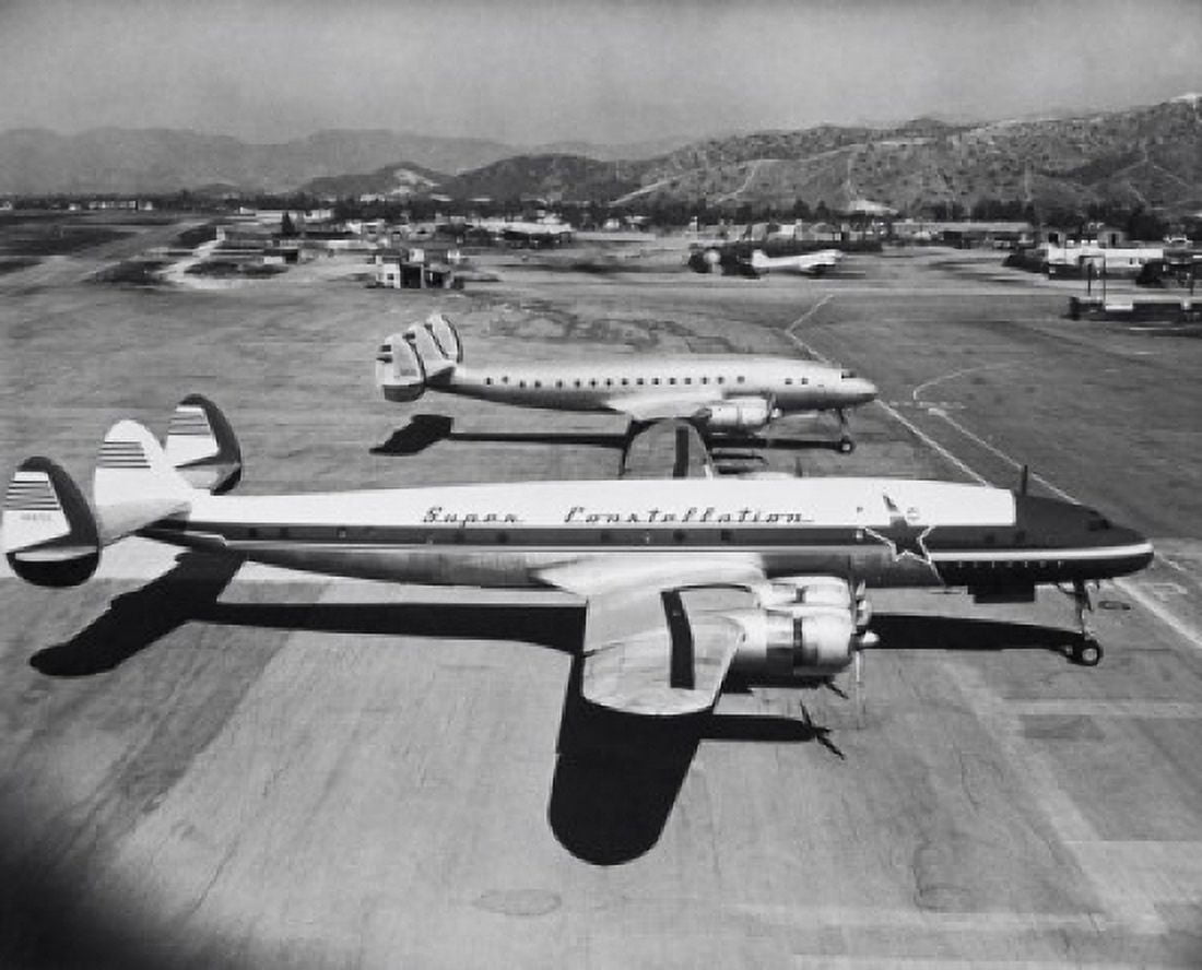 Posterazzi High angle view of two airplanes at an airport Canvas Art -  (24 x 36)