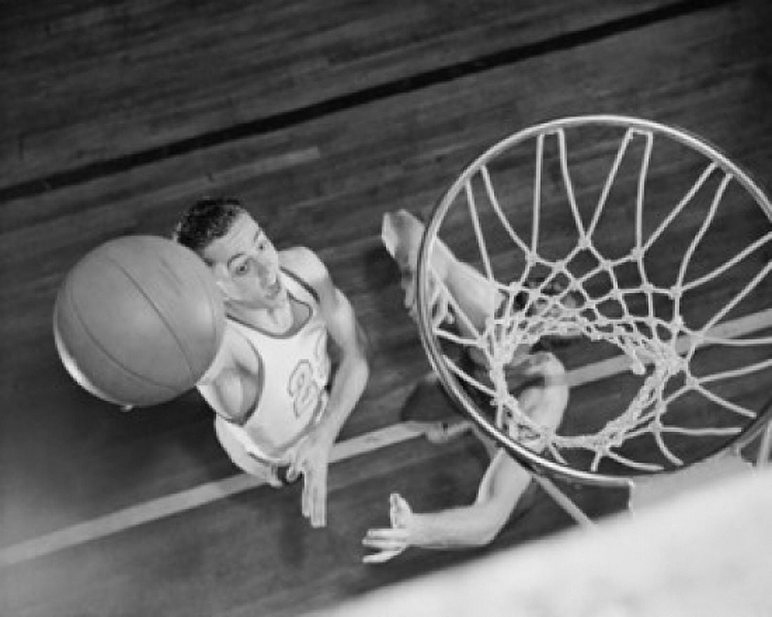 Posterazzi High angle view of two young men playing basketball Canvas Art - (24 x 36)