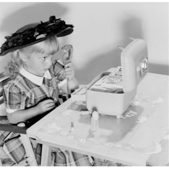 Posterazzi  Little Girl Wearing Big Hat & Looking in Hand Mirror Poster Print - 18 x 24 in.