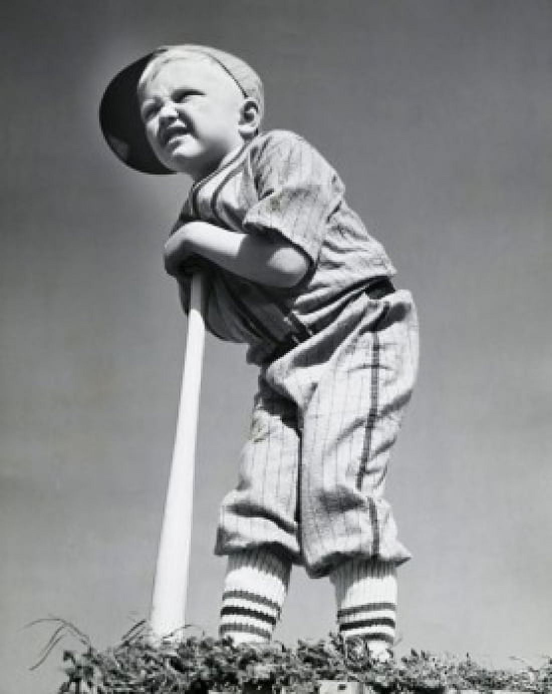 Posterazzi Low angle view of a boy leaning on a baseball bat Canvas Art - (24 x 36)