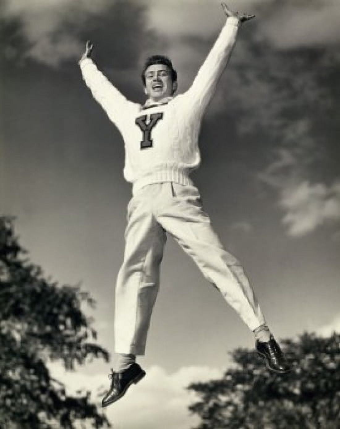Posterazzi Low angle view of a male cheerleader jumping Canvas Art - (24 x 36)