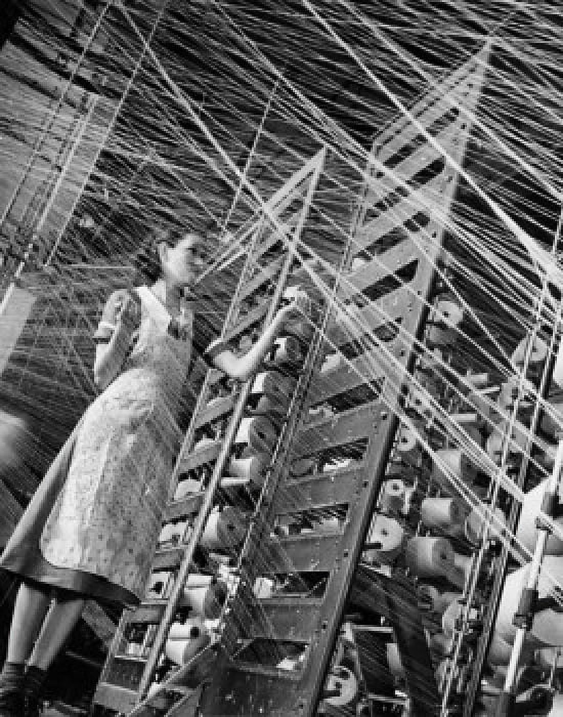 Posterazzi Low angle view of a woman working in a textile factory Canvas Art -  (24 x 36)