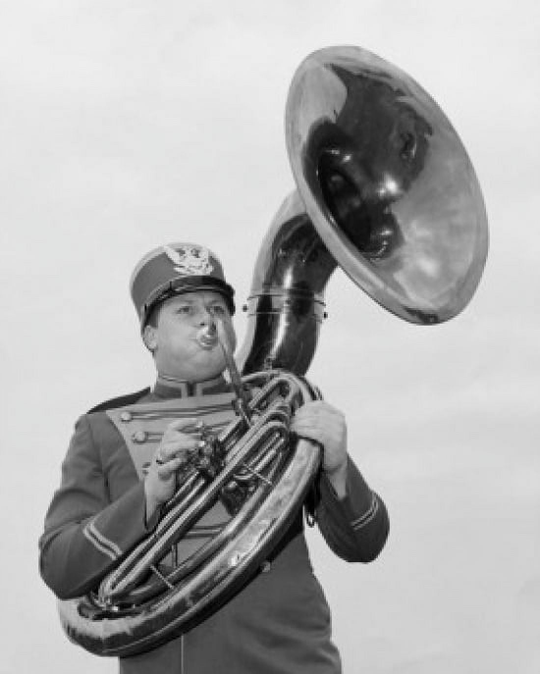 Posterazzi Low angle view of a young man playing the tuba Canvas Art - (24 x 36)