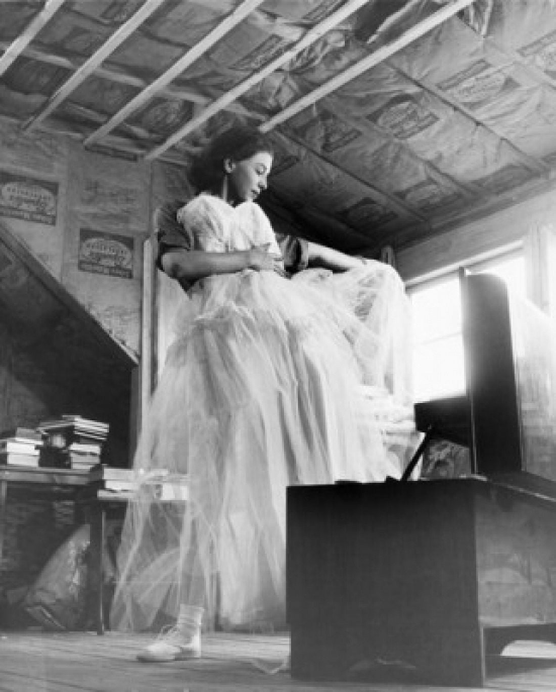 Posterazzi Low angle view of a young woman holding a dress Canvas Art -  (24 x 36)