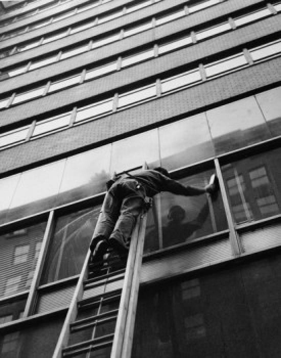 Posterazzi Low angle view of window washer cleaning window Canvas Art - (24 x 36)