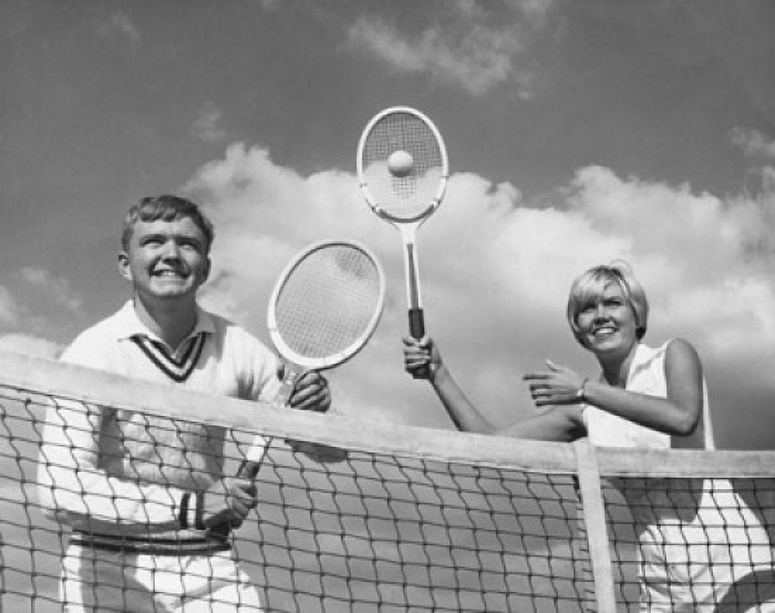 Posterazzi Low angle view of young couple playing tennis Canvas Art -  (24 x 36)