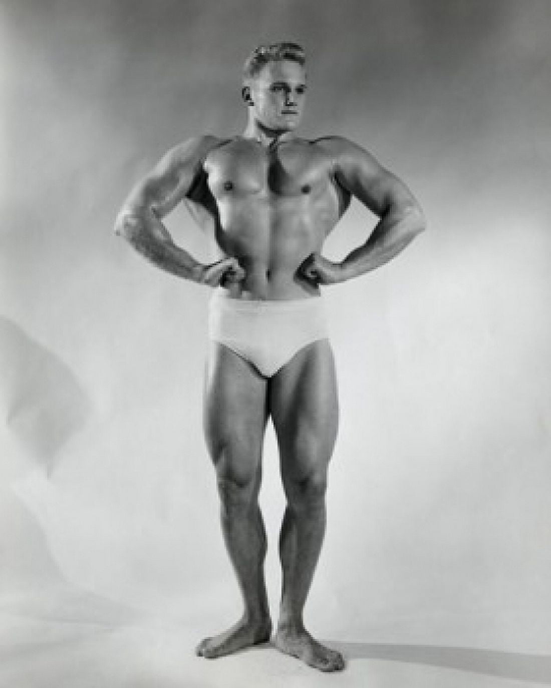 Posterazzi Male body builder flexing his muscles Canvas Art - (24 x 36)