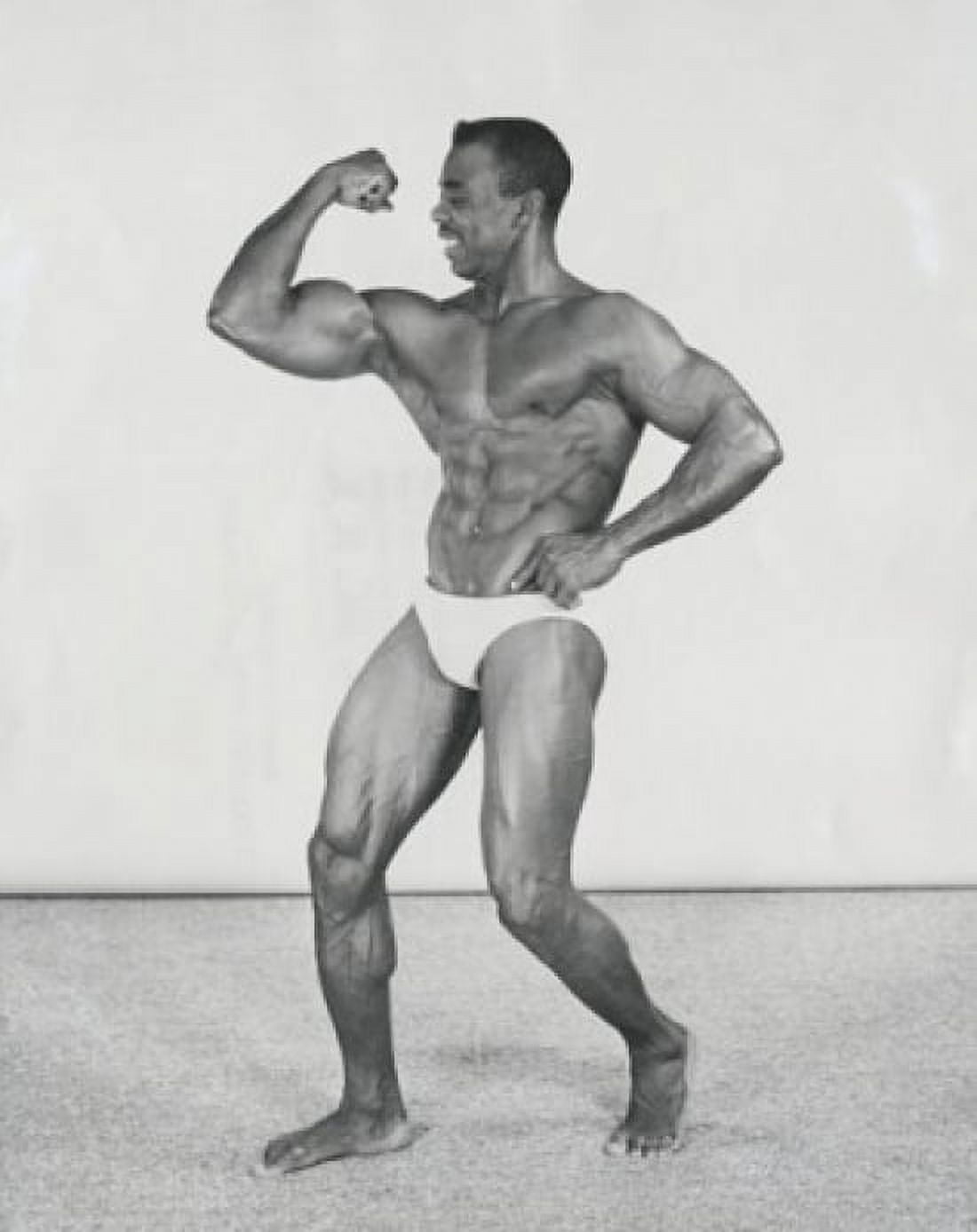 Posterazzi Male body builder flexing his muscles Canvas Art - (24 x 36)