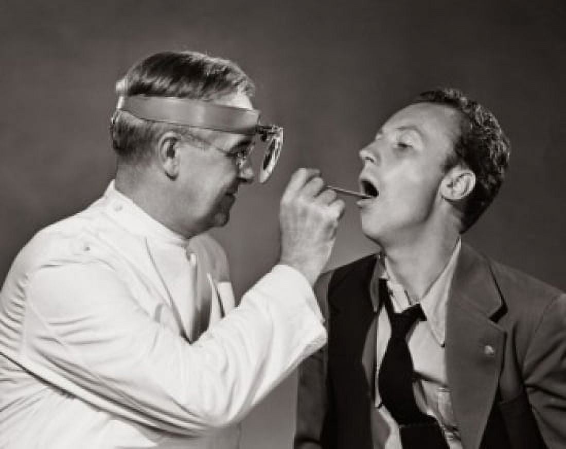 Posterazzi Male doctor examining a patient Canvas Art - (24 x 36)