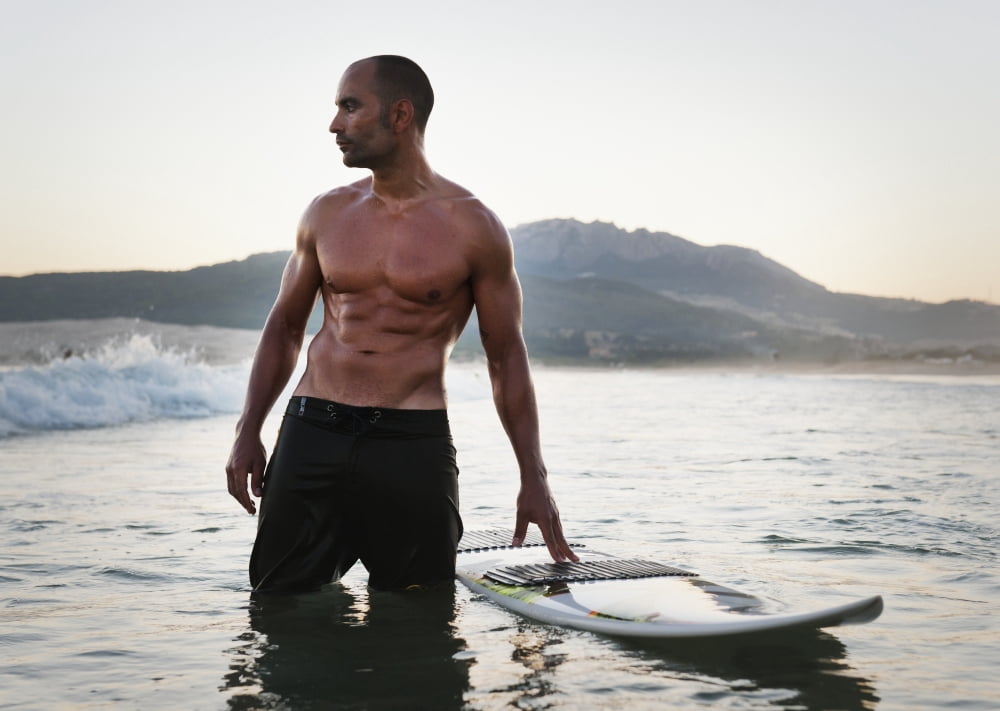 Posterazzi A Man Standing In The Water With His Surfboard Off Valdevaqueros Beach Tarifa Cadiz Andalusia Spain Canvas Art - Ben Welsh Design Pics (36 x 26)