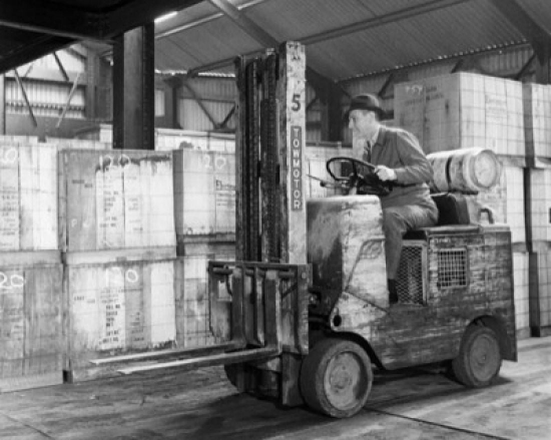 Posterazzi Man driving a forklift in a warehouse Canvas Art -  (24 x 36)
