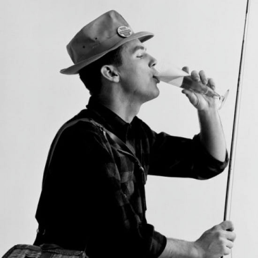 Posterazzi Man sitting drinking bear and holding fishing rod studio shot Canvas Art - (24 x 36)