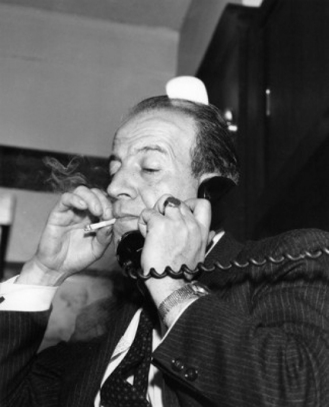 Posterazzi Man with cigarette talking on phone Canvas Art - (24 x 36)