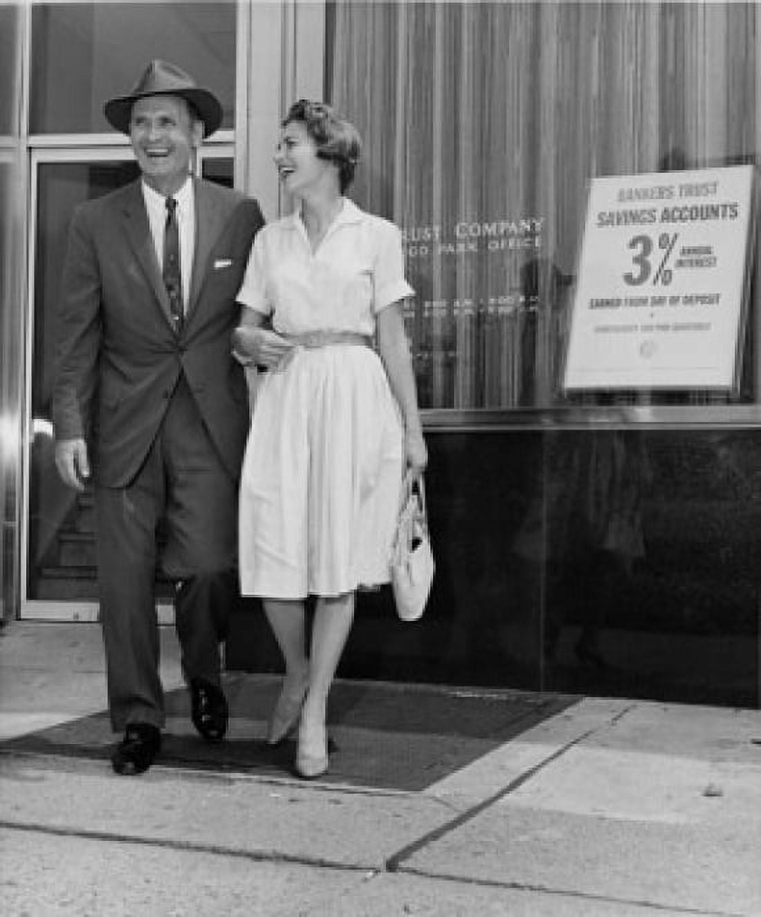 Posterazzi Mature couple leaving bank Canvas Art - (24 x 36)