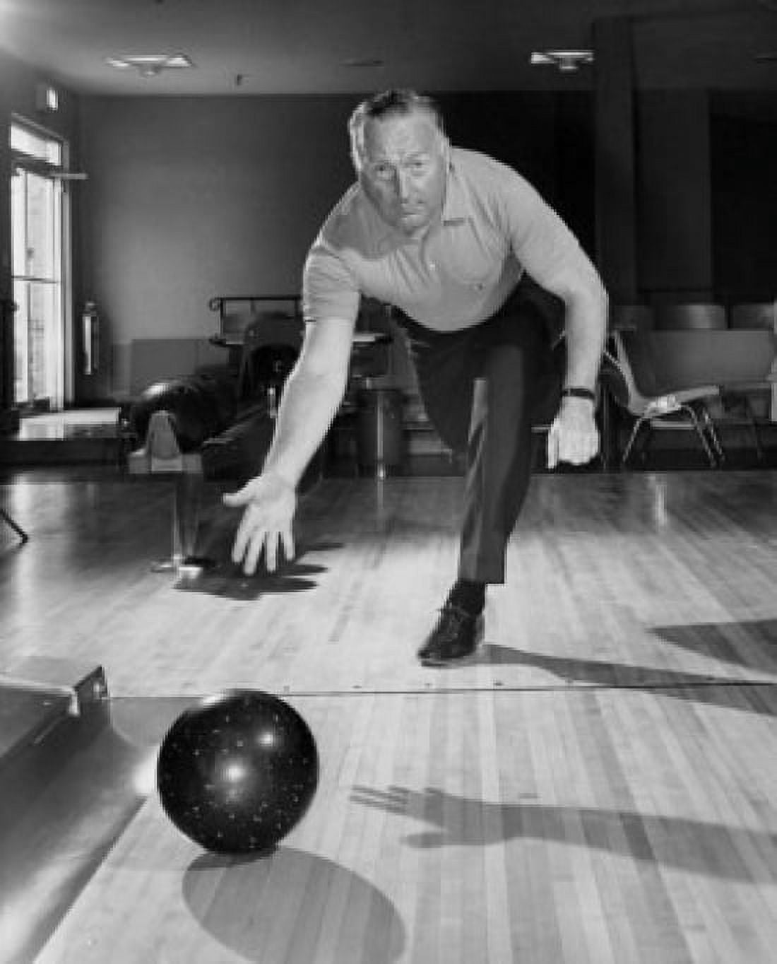 Posterazzi Mature man bowling Canvas Art - (24 x 36)