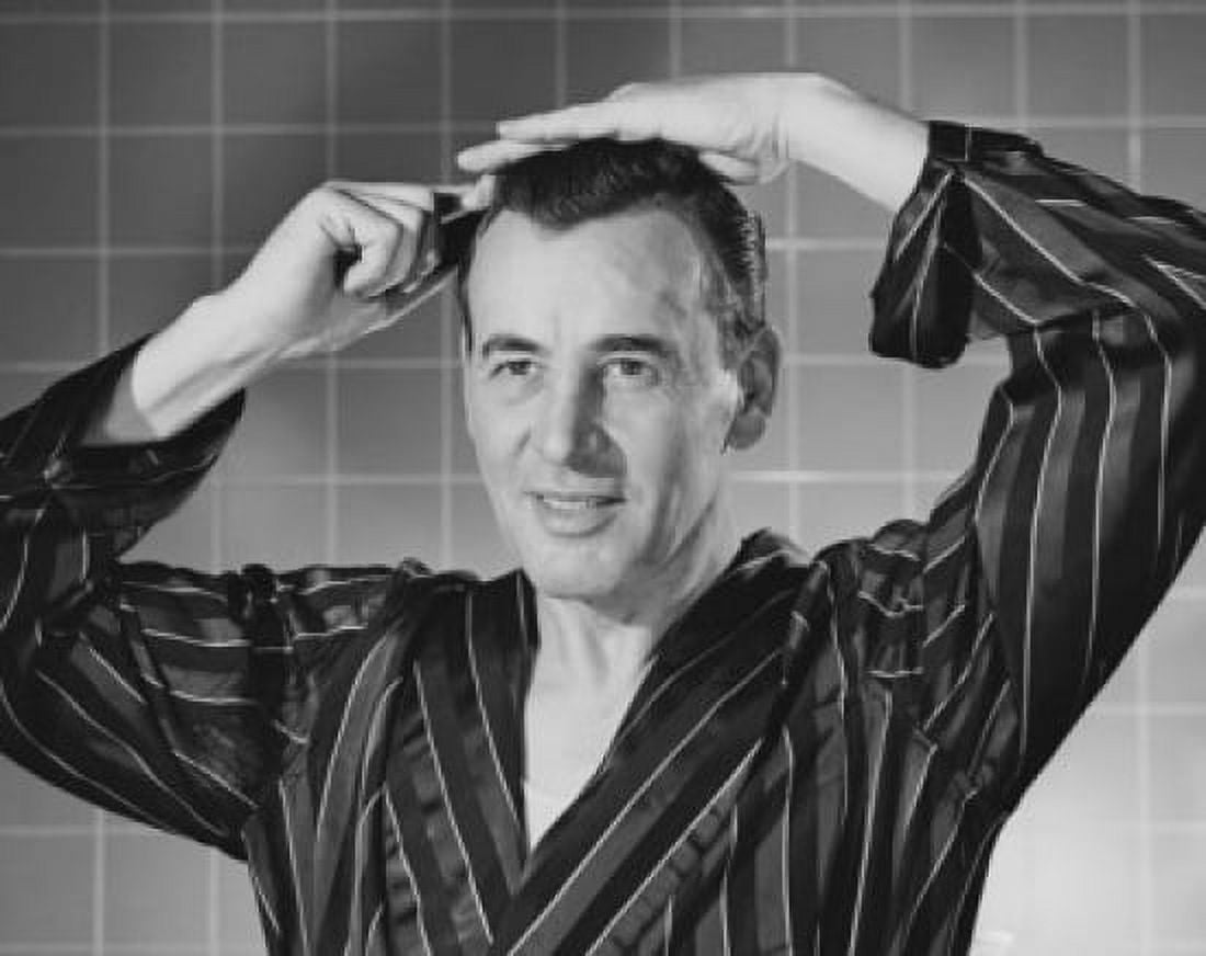 Posterazzi Mature man combing his hair Canvas Art - (24 x 36)
