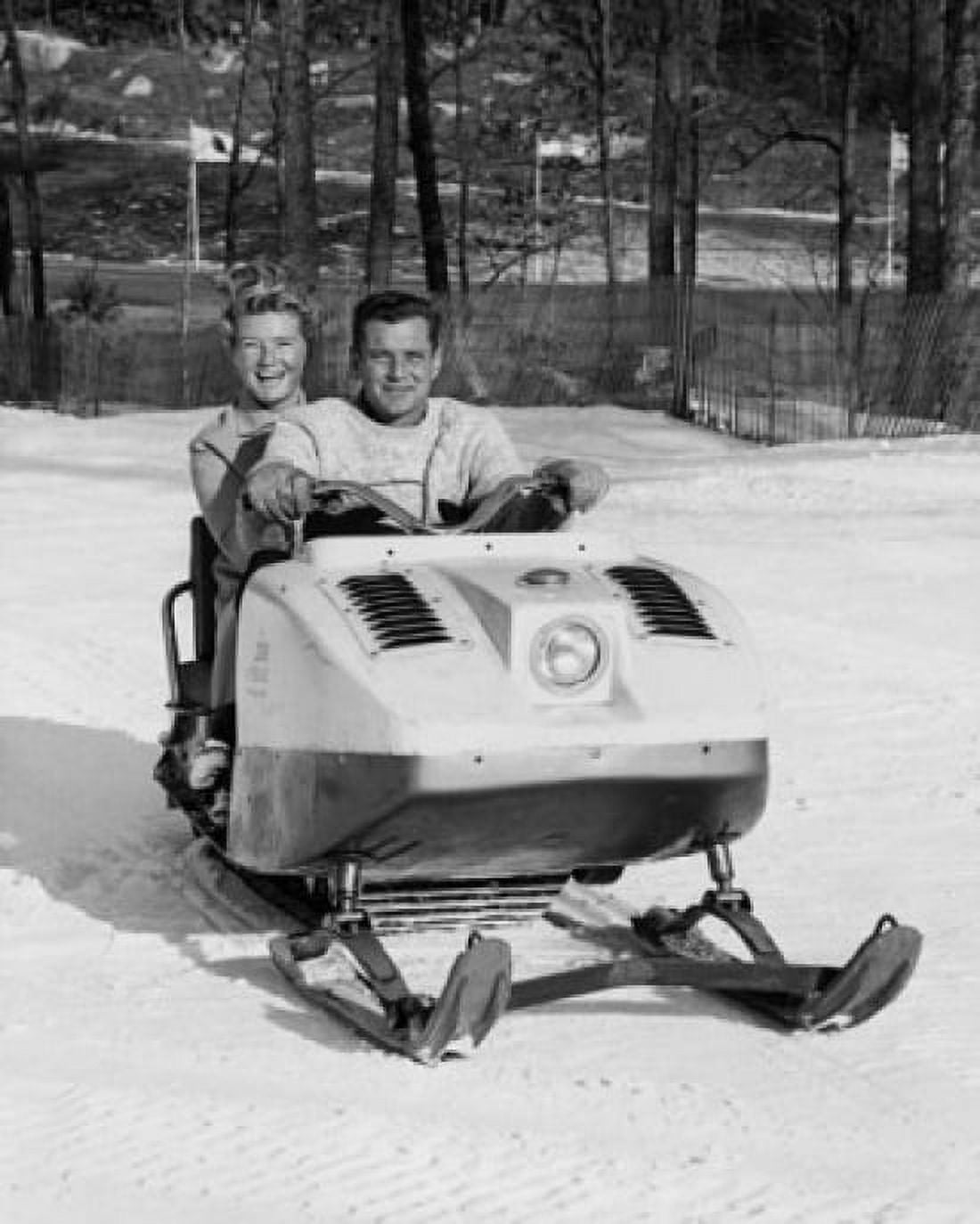 Posterazzi Mid adult couple snowmobiling Canvas Art - (24 x 36)