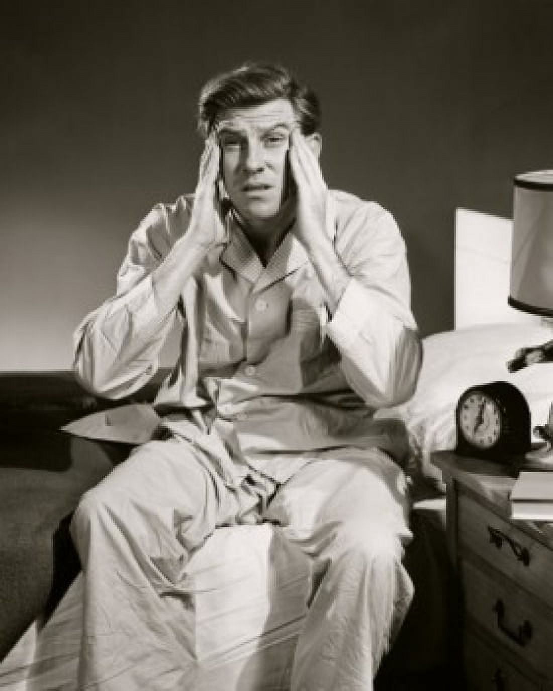 Posterazzi Mid adult man rubbing his temples Canvas Art - (24 x 36)