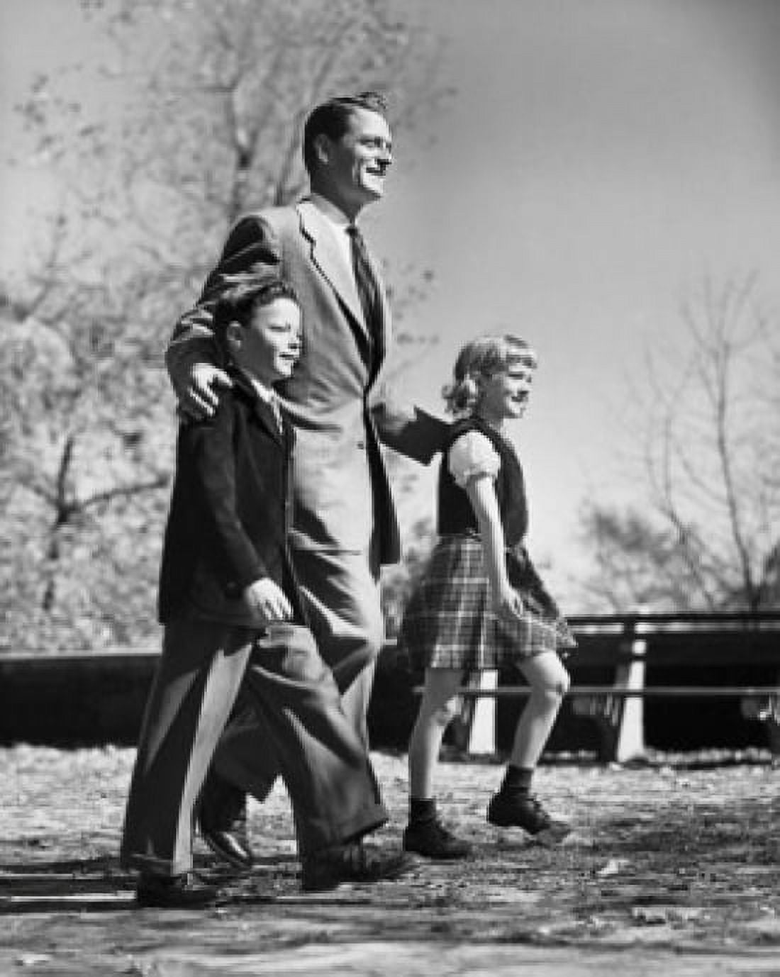 Posterazzi Mid adult man walking with his two children Canvas Art -  (24 x 36)