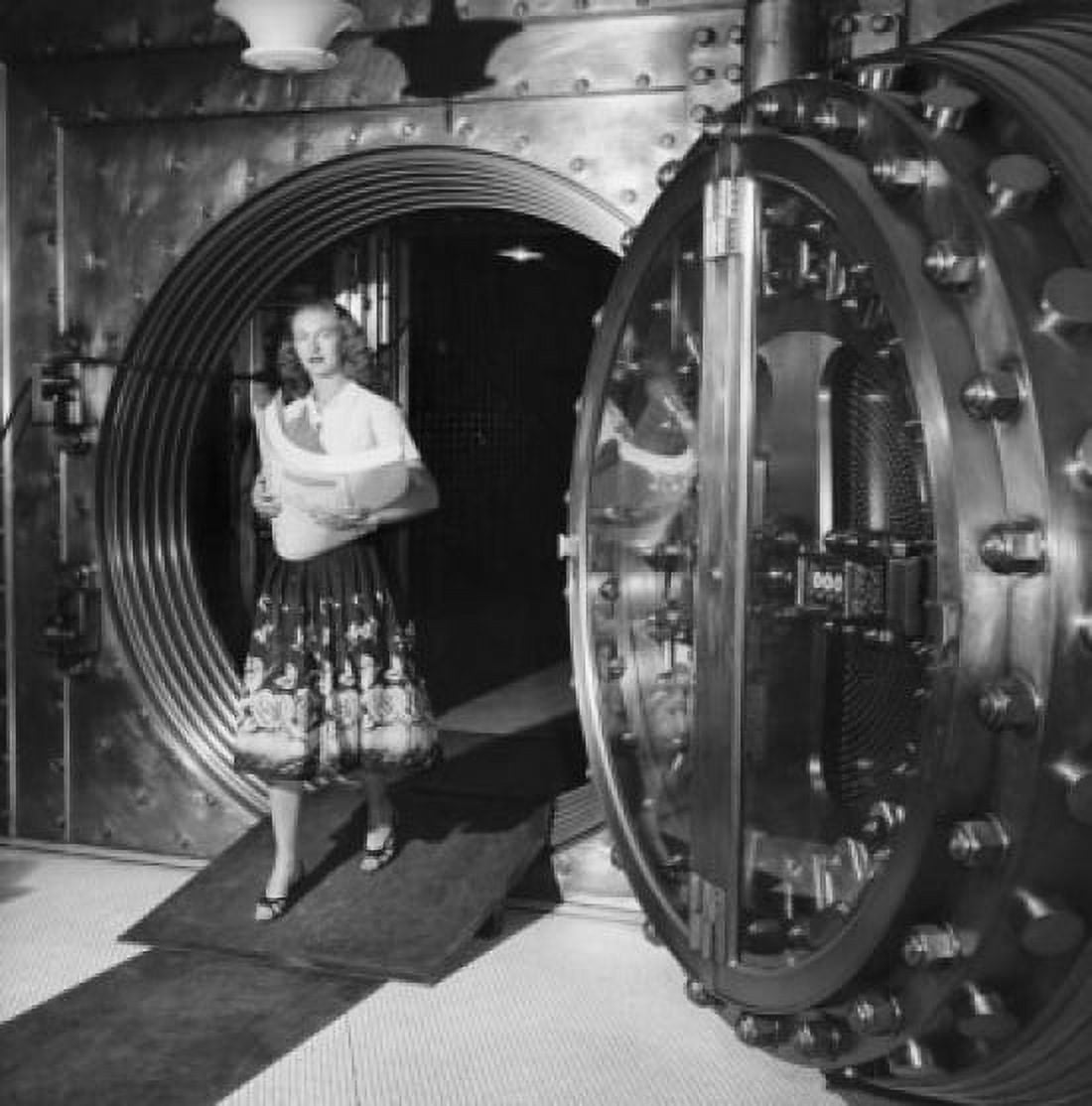 Posterazzi Mid adult woman coming out from a bank vault Canvas Art - (24 x 36)