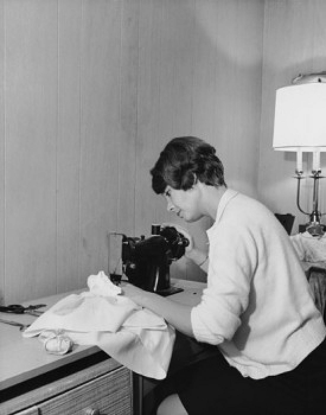 Posterazzi Mid adult woman sewing with a sewing machine Canvas Art - (24 x 36)