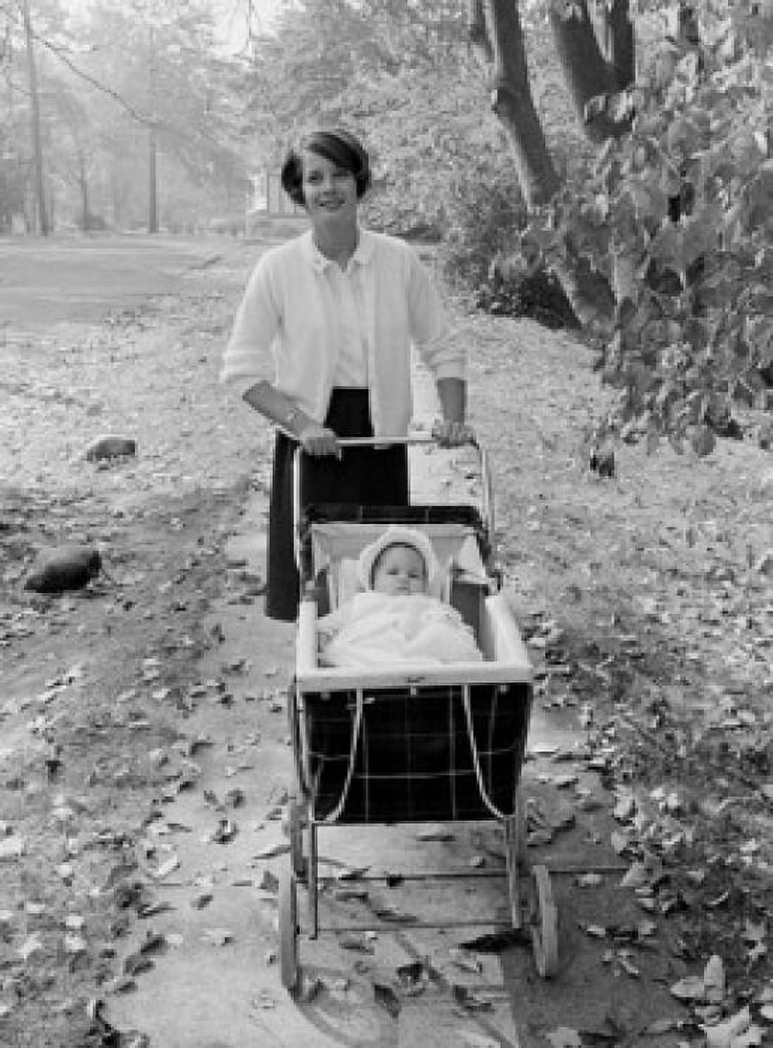 Posterazzi Mother walking with baby in baby carriage Canvas Art -  (24 x 36)