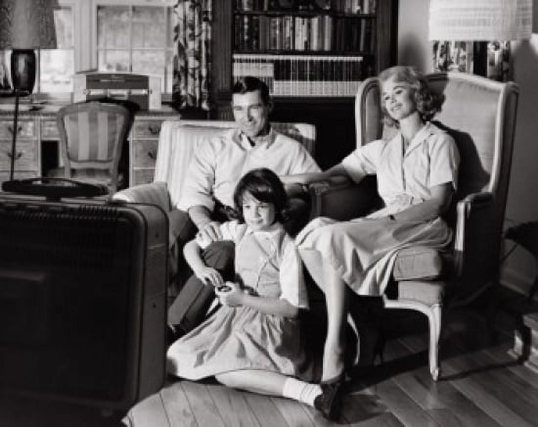 Posterazzi Parents with their daughter watching television Canvas Art - (24 x 36)