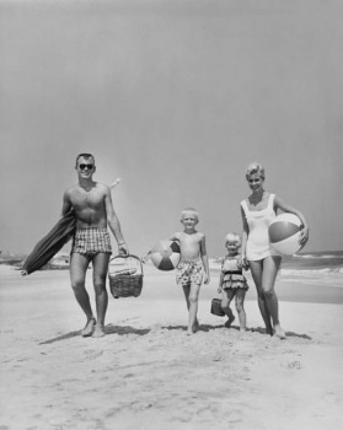Posterazzi Parents with two children walking on beach Canvas Art - (24 x 36)
