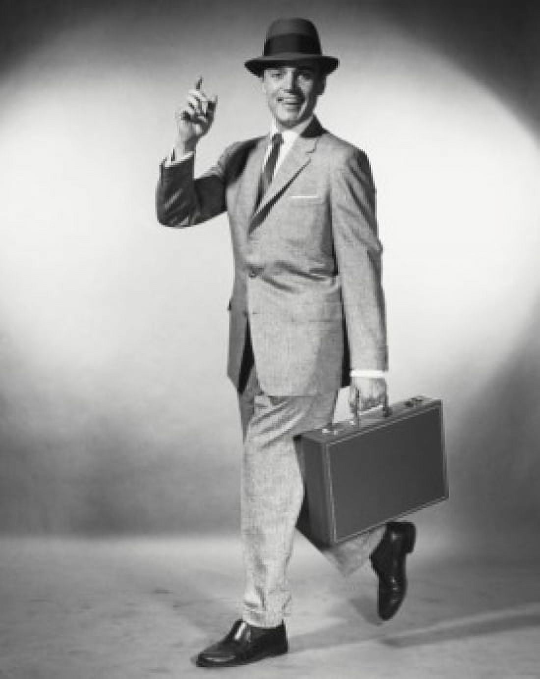 Posterazzi Portrait of a businessman carrying a briefcase Canvas Art - (24 x 36)