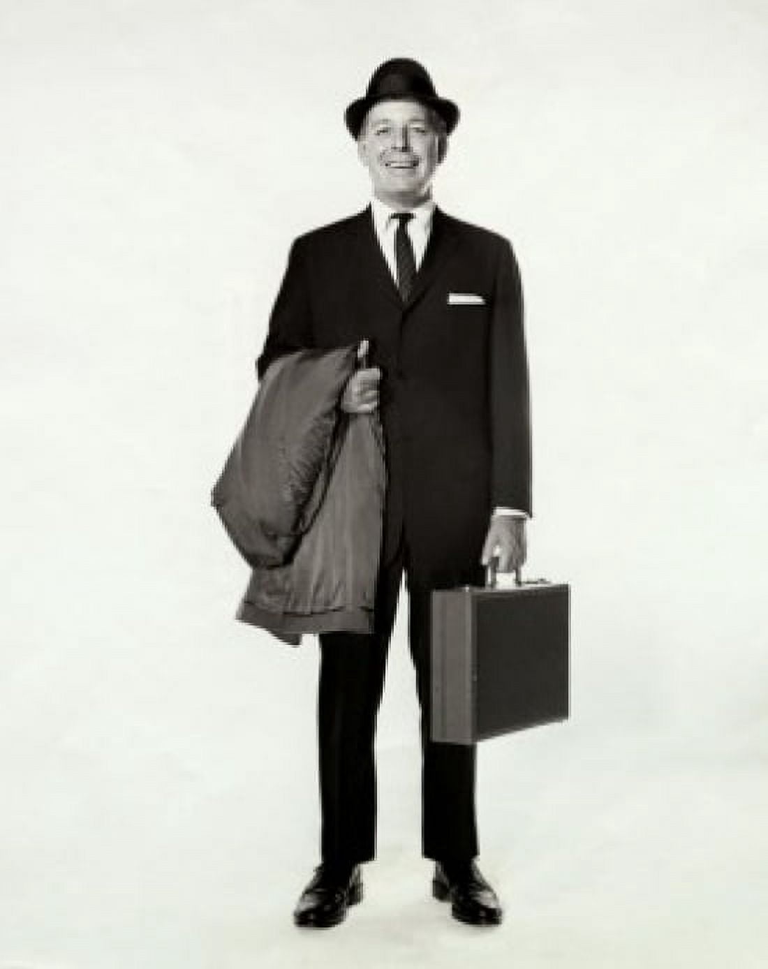 Posterazzi Portrait of a businessman holding a briefcase and an overcoat Canvas Art - (24 x 36)