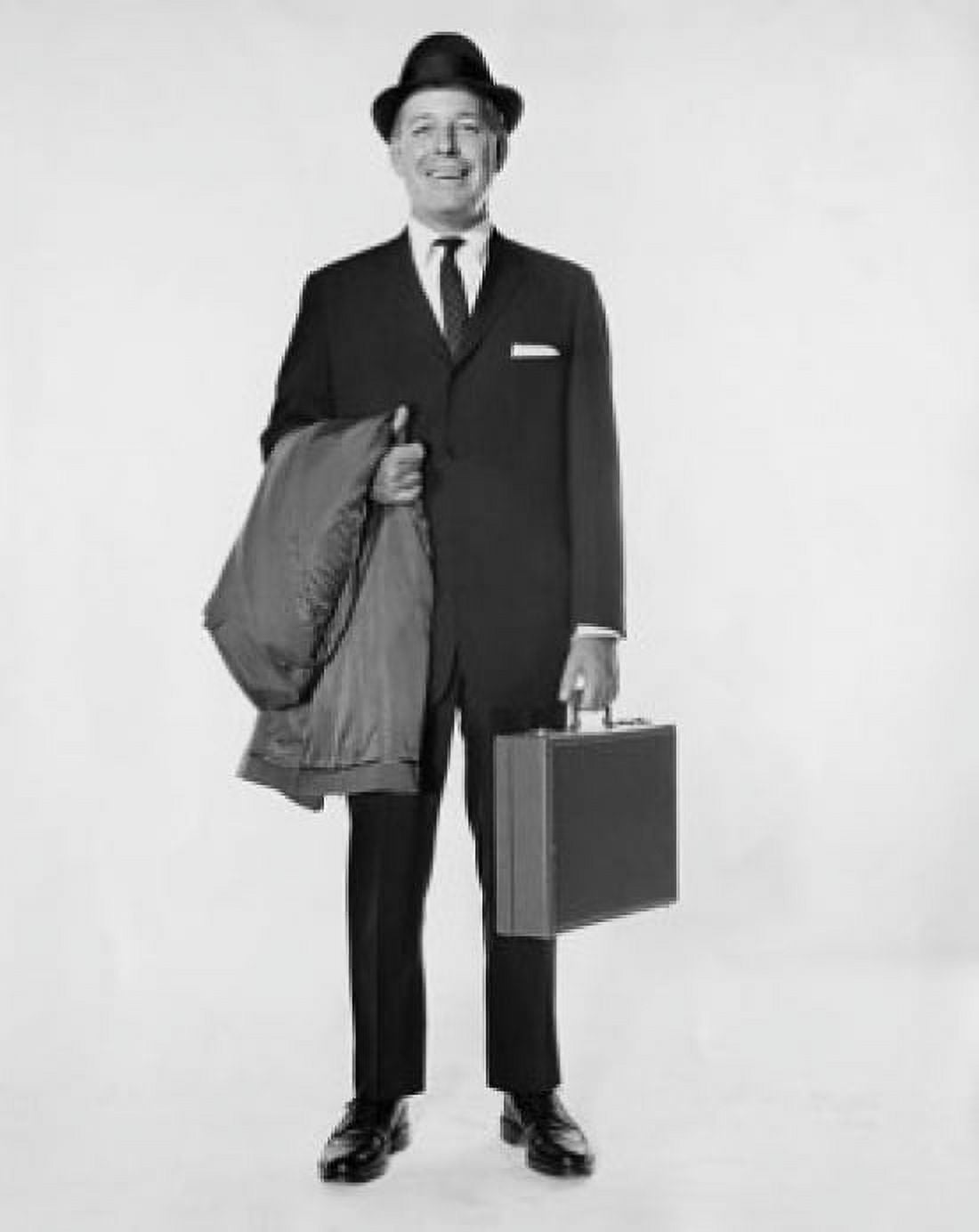 Posterazzi Portrait of a businessman holding a briefcase and an overcoat Canvas Art - (24 x 36)