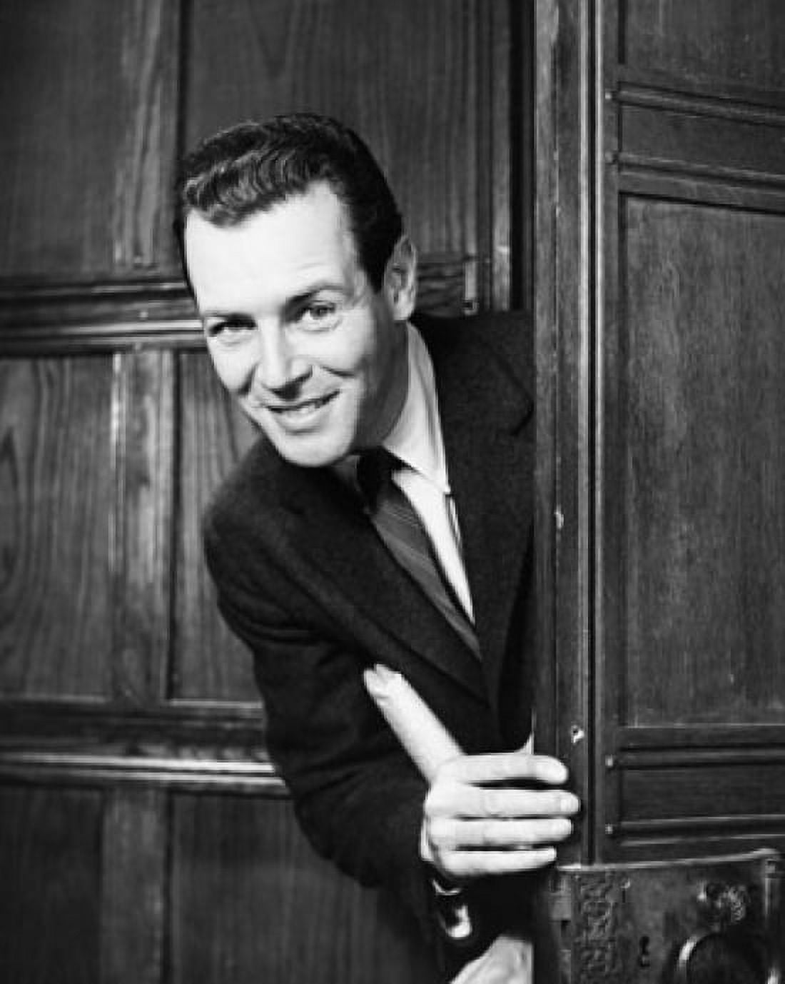 Posterazzi Portrait of a businessman peeking out from behind a door Canvas Art - (24 x 36)