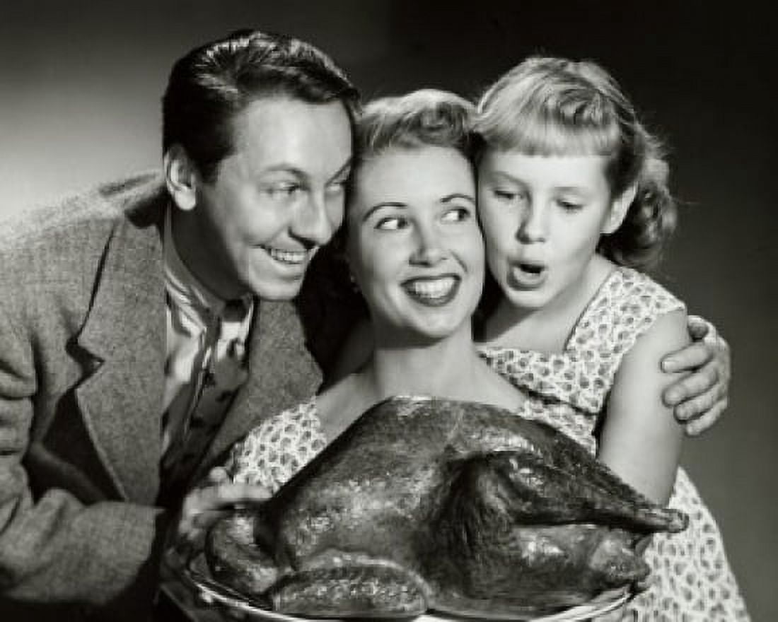 Posterazzi Portrait of a family holding a turkey on a platter Canvas Art - (24 x 36)