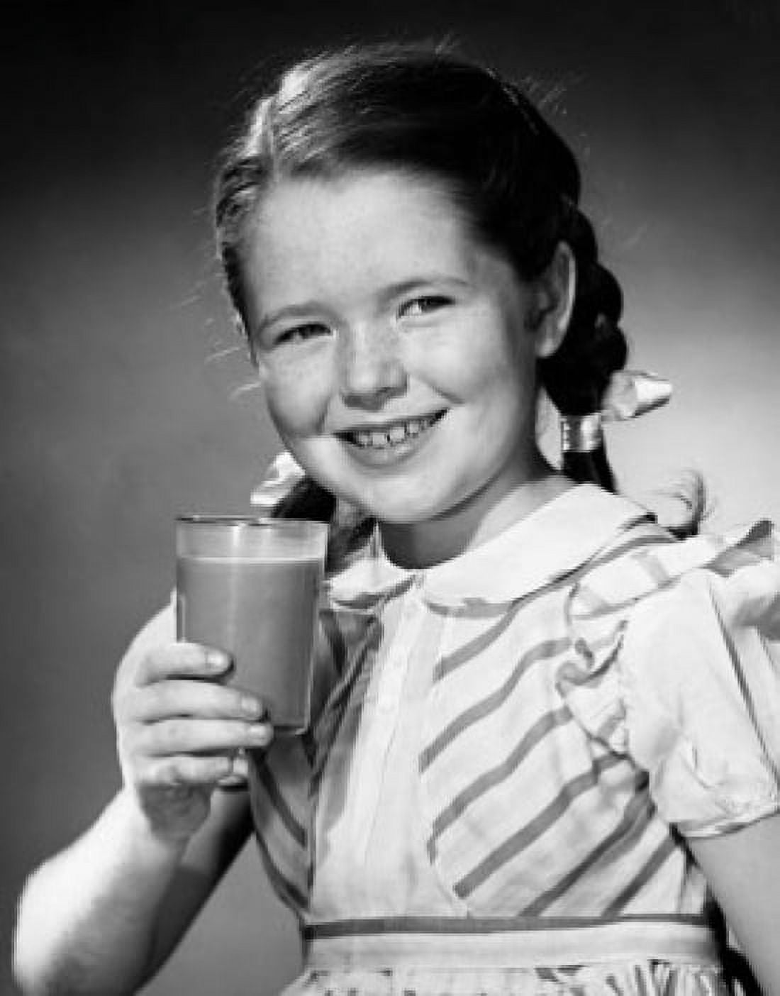 Posterazzi Portrait of a girl holding a glass of chocolate milk Canvas Art - (24 x 36)