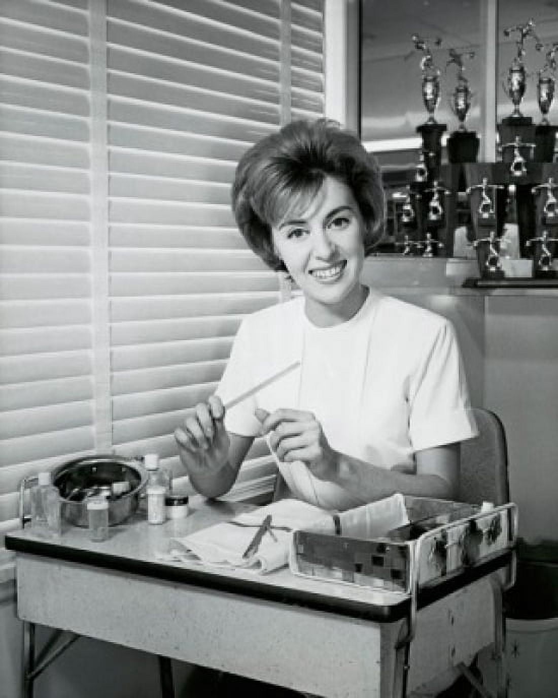 Posterazzi Portrait of a manicurist sitting in a salon and smiling 1964 Canvas Art -  (24 x 36)