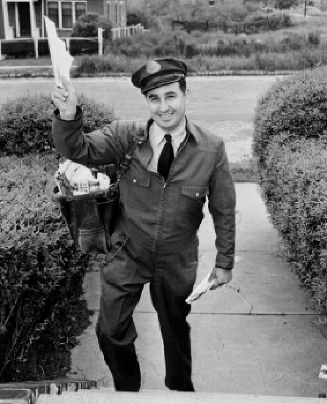 Posterazzi Portrait of a postman delivering mail Canvas Art - (24 x 36)