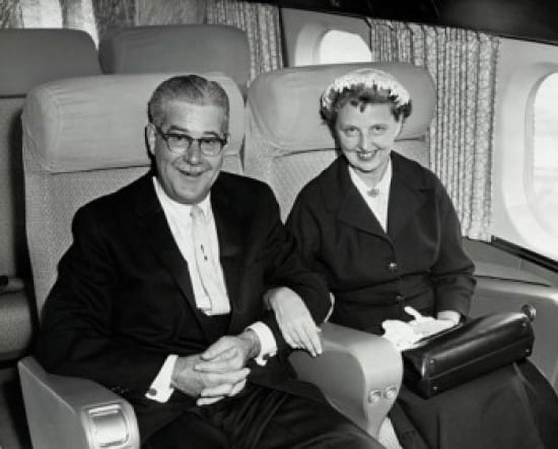 Posterazzi Portrait of a senior couple sitting in an airplane Canvas Art -  (24 x 36)