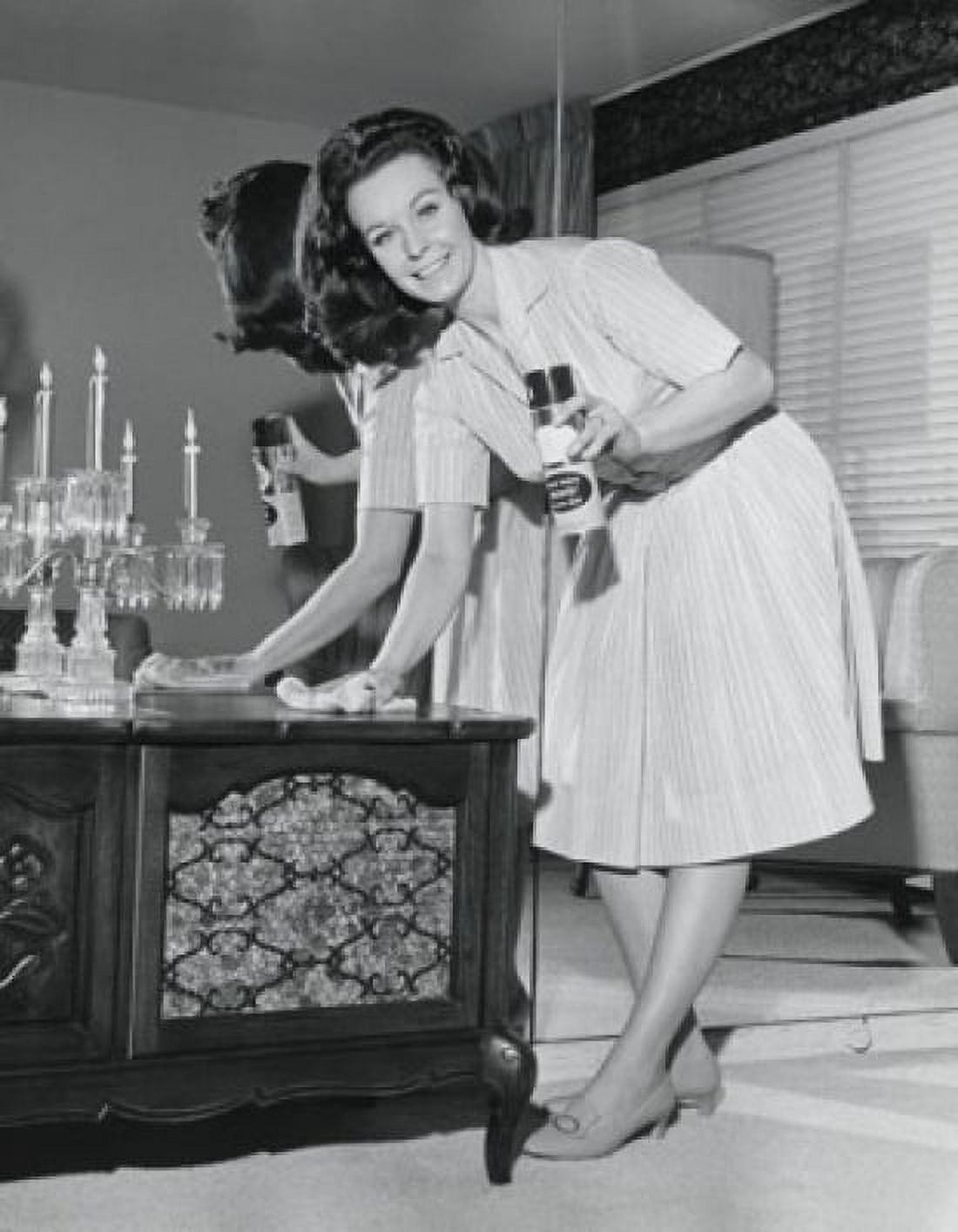Posterazzi Portrait of a young woman polishing furniture Canvas Art - (24 x 36)