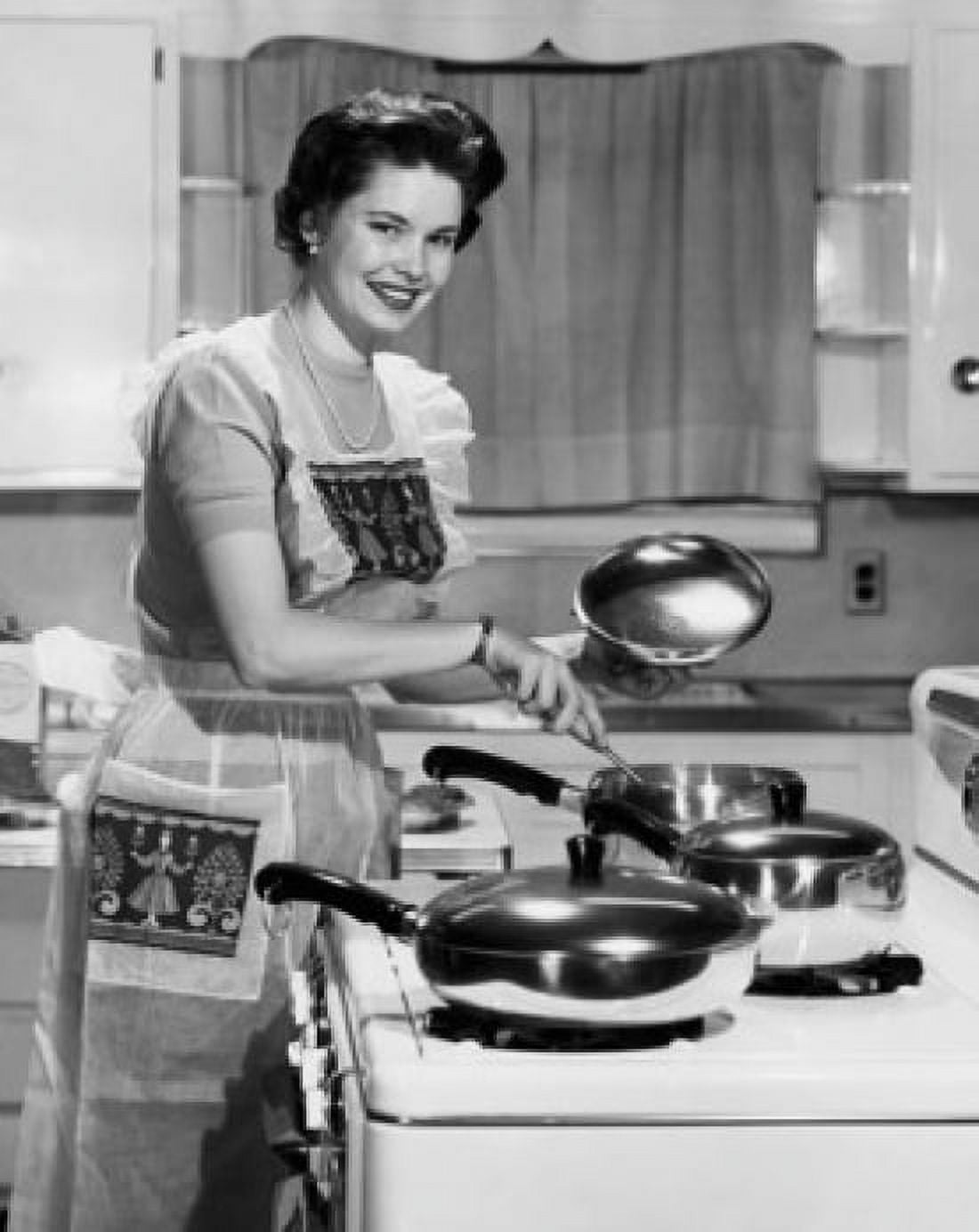 Posterazzi Portrait of a young woman preparing food in the kitchen Canvas Art - (24 x 36)