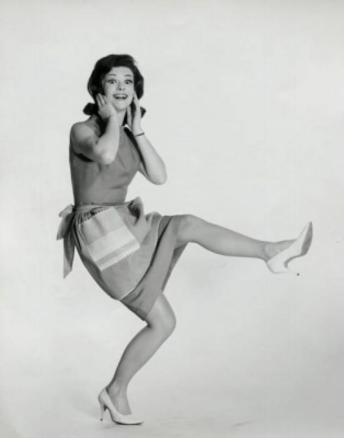 Posterazzi Portrait of a young woman standing on one leg and smiling Canvas Art - (24 x 36)