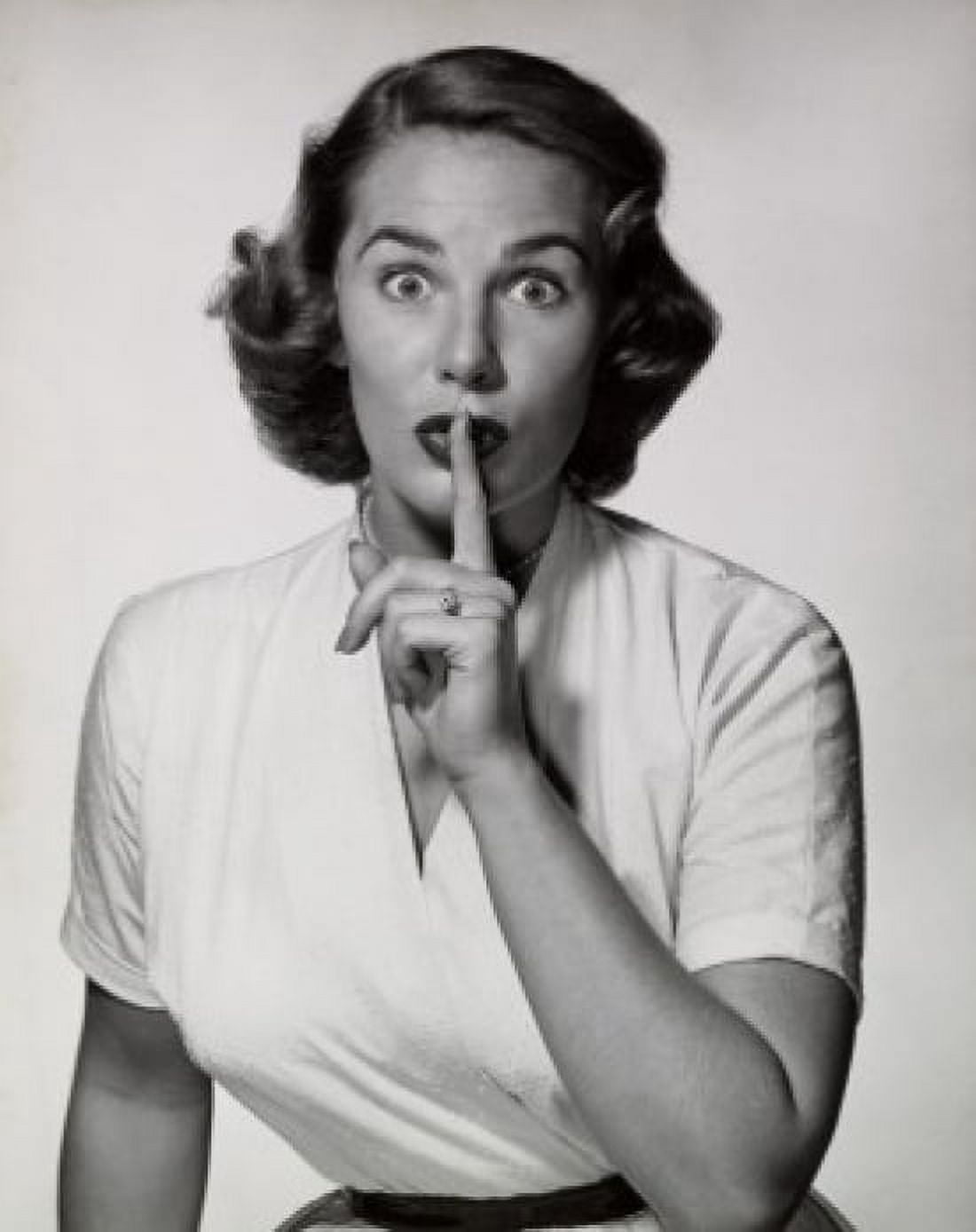 Posterazzi Portrait of a young woman with her finger on her lips Canvas Art - (24 x 36)