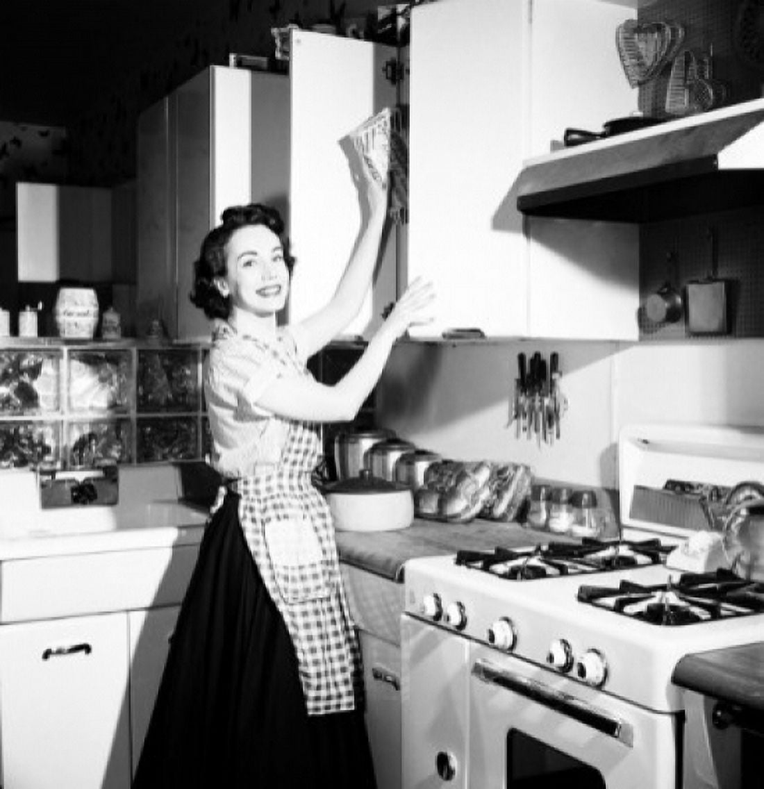 Posterazzi Portrait of a young woman working in a kitchen Canvas Art - (24 x 36)